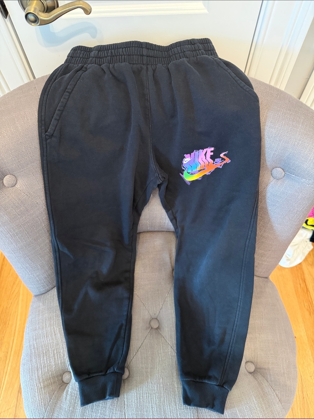 Nike Kids Black Joggers with Rainbow Swoosh Logo